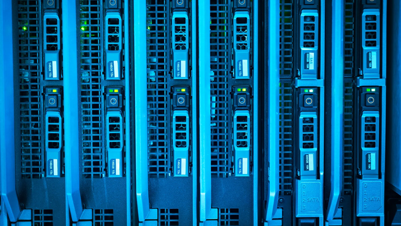 Detailed image of illuminated server racks showcasing modern technology infrastructure.
